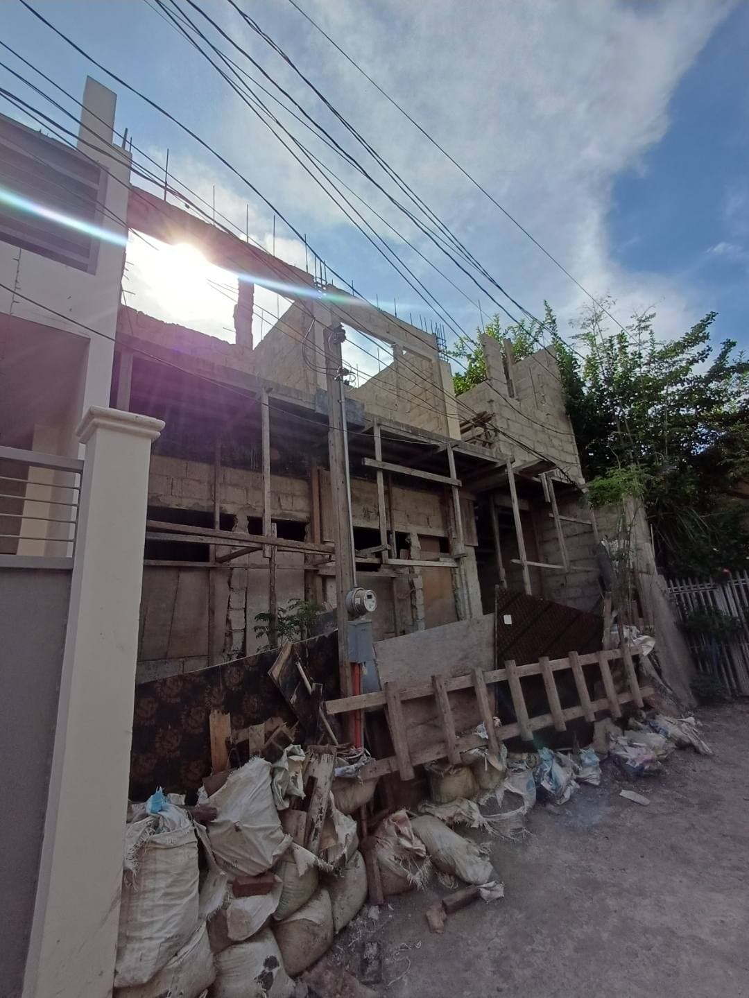 HOUSE AND LOT WITH UNFINISHED APARTMENT - photo 2